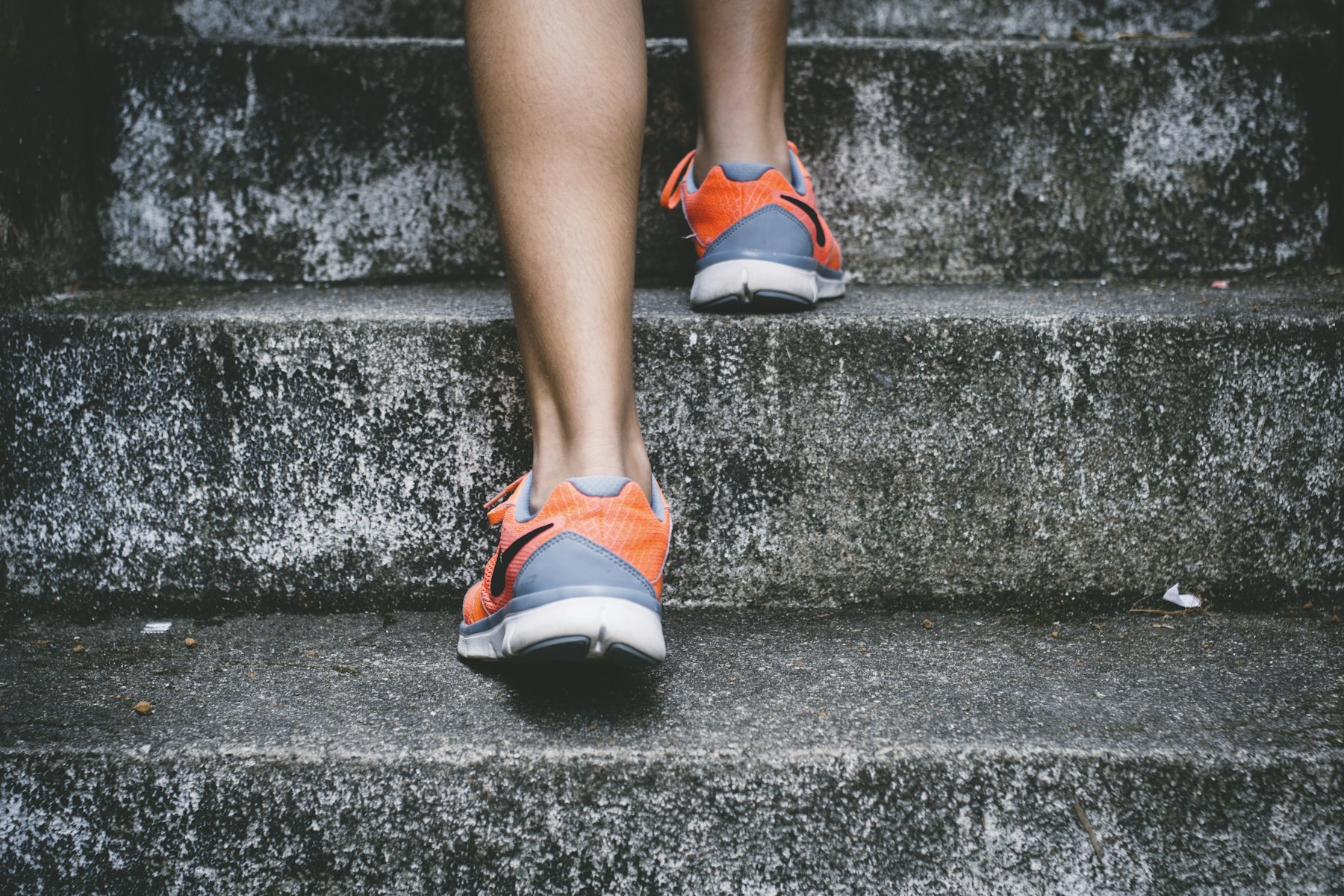 Running shoes on concrete steps